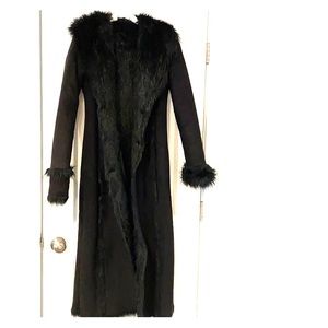 Bebe full length fur coat in black.